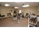 Community fitness center well equipped with various exercise machines at 1213 Tallywood Dr # 7007, Sarasota, FL 34237