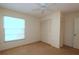 Spacious bedroom with large closet and ceiling fan at 1213 Tallywood Dr # 7007, Sarasota, FL 34237
