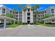 Condo building with covered parking and accessible entrance at 1020 Tidewater Shores Loop # 108, Bradenton, FL 34208