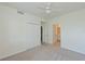 Bright bedroom with ceiling fan and carpet at 1020 Tidewater Shores Loop # 108, Bradenton, FL 34208