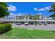 Three-story building with covered parking and landscaping at 1020 Tidewater Shores Loop # 108, Bradenton, FL 34208