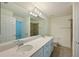 Double vanity bathroom with quartz countertop at 1020 Tidewater Shores Loop # 108, Bradenton, FL 34208