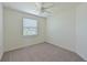 Spacious bedroom with ceiling fan and window blinds at 1020 Tidewater Shores Loop # 108, Bradenton, FL 34208