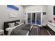 Main bedroom with fireplace and patio access at 1800 Webber St, Sarasota, FL 34239