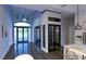 Bright entryway with wine storage at 1800 Webber St, Sarasota, FL 34239