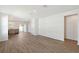 Open-concept living room featuring new hardwood floors and lots of natural light at 1643 35Th St, Sarasota, FL 34234