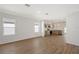 Sunlit living room with an open floor plan that connects to the kitchen at 1643 35Th St, Sarasota, FL 34234