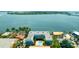 Aerial view of the property with a pool and waterfront views at 1301 Bay N Dr # 7A, Bradenton Beach, FL 34217