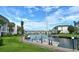 Scenic view of the community marina with boats docked along a canal at 4350 Chatham Dr # E307, Longboat Key, FL 34228
