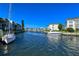Boat dock with sailboats and motorboats on the canal at 4350 Chatham Dr # E307, Longboat Key, FL 34228