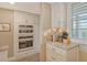Kitchen with white cabinets, double oven, and granite countertops at 4350 Chatham Dr # E307, Longboat Key, FL 34228