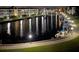 View of the marina with boats and docks at night at 4350 Chatham Dr # E307, Longboat Key, FL 34228