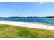 Scenic waterfront view with sandy shoreline at 325 Villoresi Blvd, Nokomis, FL 34275