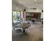 Community clubhouse with seating, games, and a library at 4480 Ironwood Cir # 308A, Bradenton, FL 34209