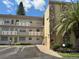 Two-story condo building with ample parking and lush landscaping at 4480 Ironwood Cir # 308A, Bradenton, FL 34209