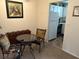 Dining area with kitchen view, small table and chairs at 4480 Ironwood Cir # 308A, Bradenton, FL 34209