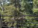 View from balcony features lush green trees and foliage at 4480 Ironwood Cir # 308A, Bradenton, FL 34209