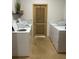 Shared laundry room with several coin-operated machines at 4480 Ironwood Cir # 308A, Bradenton, FL 34209