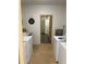 Shared laundry room with additional access to storage at 4480 Ironwood Cir # 308A, Bradenton, FL 34209