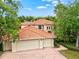 Beautiful two-story home with three-car garage and tile roof at 10115 Day Lily Ct, Bradenton, FL 34212
