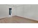 Bright bedroom with wood floors and en-suite bathroom at 2605 Waterfront Cir, Sarasota, FL 34240