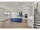 Modern kitchen with a large island and stainless steel appliances at 2605 Waterfront Cir, Sarasota, FL 34240