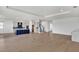 Open concept kitchen with island and hardwood floors at 2605 Waterfront Cir, Sarasota, FL 34240