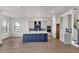 Modern kitchen with a large island and stainless steel appliances at 2605 Waterfront Cir, Sarasota, FL 34240