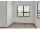 Bright living room with large windows and lake view at 2605 Waterfront Cir, Sarasota, FL 34240
