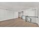 Spacious loft area with hardwood floors at 2605 Waterfront Cir, Sarasota, FL 34240