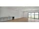 Recreation room with wet bar and sliding glass doors to patio at 2605 Waterfront Cir, Sarasota, FL 34240