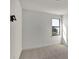 Bright bedroom with window and carpet at 2625 Waterfront Cir, Sarasota, FL 34240