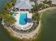 Resort-style pool and spa with lounge chairs, offering a relaxing community amenity at 10520 Boardwalk Loop # 302, Bradenton, FL 34202