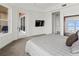 Primary bedroom with private balcony and large windows at 10520 Boardwalk Loop # 302, Bradenton, FL 34202