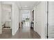 Bright hallway with tile floors and access to multiple rooms at 10520 Boardwalk Loop # 302, Bradenton, FL 34202