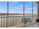 Screened balcony overlooking lake and community at 10520 Boardwalk Loop # 302, Bradenton, FL 34202