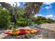 Kayak on the sandy beach by the water at 3301 Bay Shore Rd, Sarasota, FL 34234