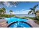 Inviting pool and spa with waterfront view at 3301 Bay Shore Rd, Sarasota, FL 34234
