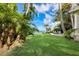 Inviting pool with patio furniture and water views at 3301 Bay Shore Rd, Sarasota, FL 34234