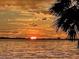 Stunning sunset over the water, creating a picturesque scene at 3301 Bay Shore Rd, Sarasota, FL 34234