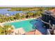 Resort-style pool with lounge chairs and waterfront views at 10115 Day Lily Ct, Bradenton, FL 34212