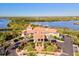 Community clubhouse with landscaping and circular driveway at 10115 Day Lily Ct, Bradenton, FL 34212