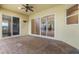 Covered patio with brick pavers and pool view at 10115 Day Lily Ct, Bradenton, FL 34212