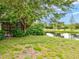 Peaceful backyard oasis with water view and lush foliage at 10115 Day Lily Ct, Bradenton, FL 34212