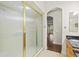 Bathroom with large shower and frosted glass door at 10115 Day Lily Ct, Bradenton, FL 34212