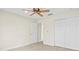 Bedroom with double door closet and carpet at 10115 Day Lily Ct, Bradenton, FL 34212