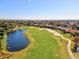 Aerial view of golf course and residential area at 10115 Day Lily Ct, Bradenton, FL 34212