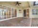 Covered patio with brick pavers and pool access at 10115 Day Lily Ct, Bradenton, FL 34212