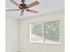 Bedroom with ceiling fan and window blinds at 10115 Day Lily Ct, Bradenton, FL 34212