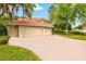 Beautiful three-car garage home with brick driveway at 10115 Day Lily Ct, Bradenton, FL 34212
